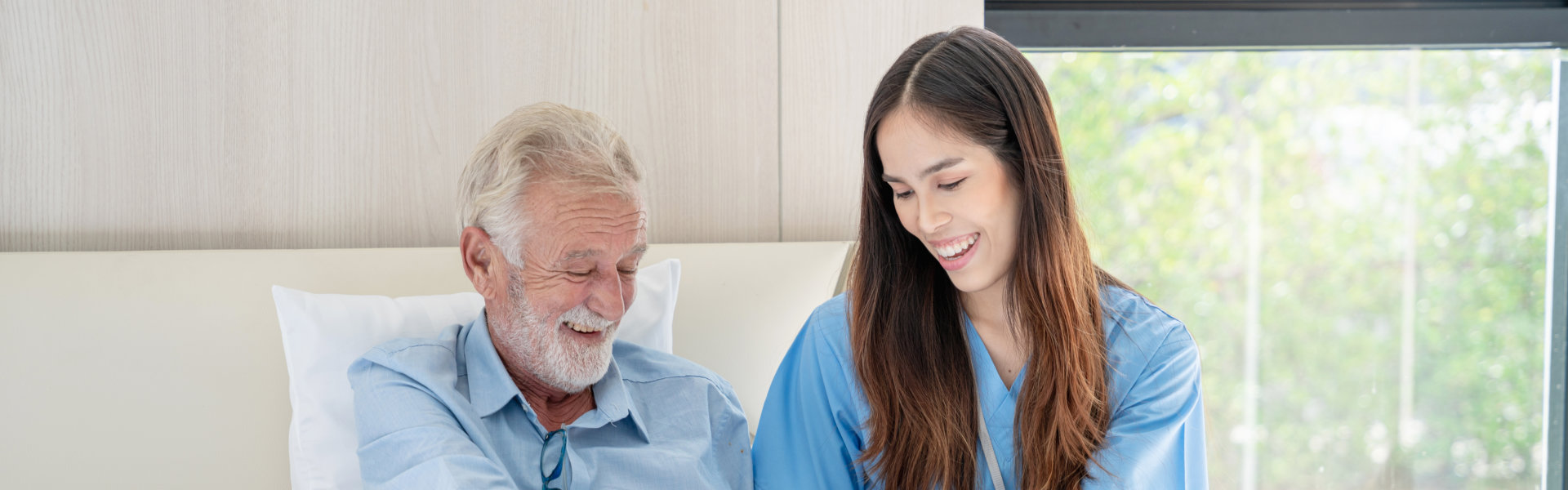 elderly man laughing